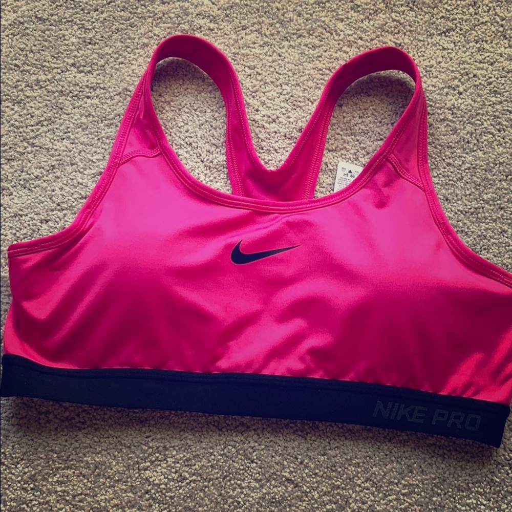 Nike pink sports bra—offers welcome :)